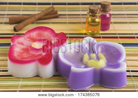 Exclusive organic handmade soaps in the shape of orchid. Spa concept.