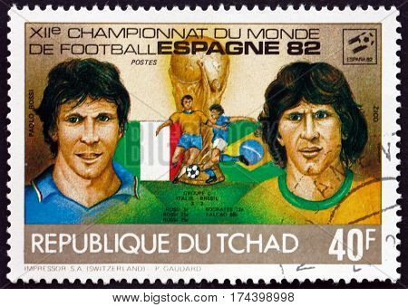 CHAD - CIRCA 1982: a stamp printed in Chad shows Paolo Rossi and Zico soccer players circa 1982
