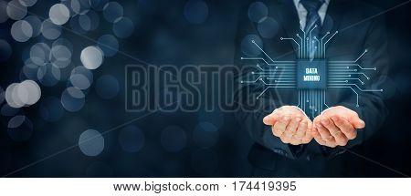 Data mining (data-minig) concept. Abstract symbol of a chip with text data mining, connected with data represented by points.