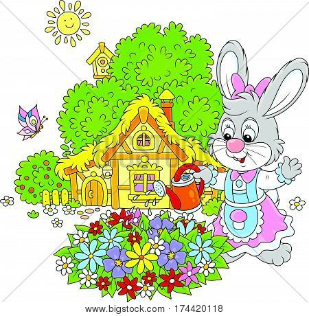 Easter Bunny watering beautiful flowers in a flowerbed in front of its farmhouse