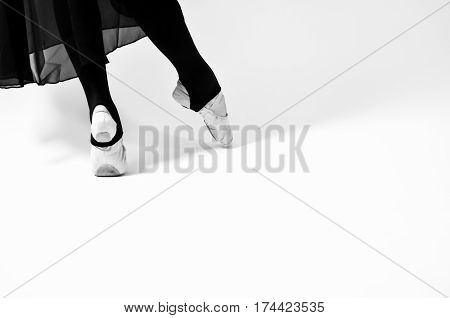 black and white photo of ballet dancer on white background