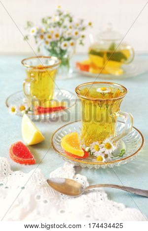 Summer Tea Party: Herbal tea with fruit jelly. Toned image