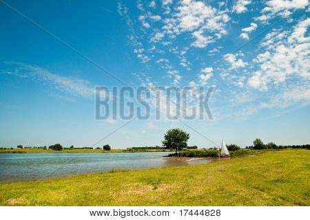 Landscape with river the Lek in Holland