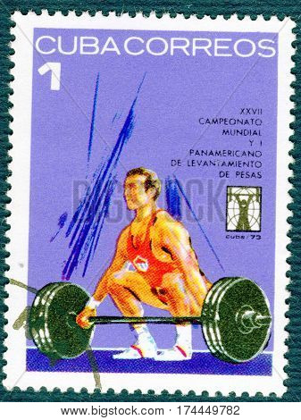 CUBA - CIRCA 1973: Postage stamp printed in Cuba  with a picture of a weightlifting, from the series 