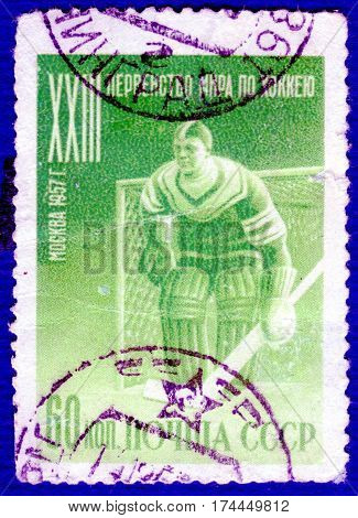 USSR - CIRCA 1957: Postage stamp printed in USSR  with a picture of a hockey player, with the inscription 