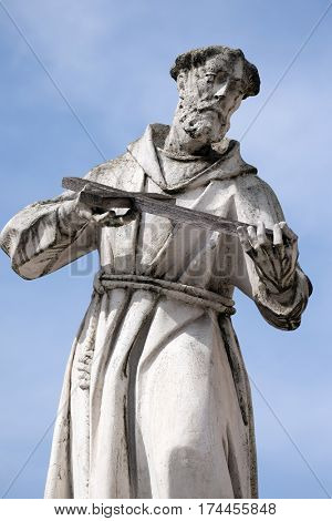 MARIBOR, SLOVENIA - APRIL 03: Saint Francis of Assissi statue, Plague column at Main Square of the city of Maribor in Slovenia, Europe. Historical religious sculpture, April 03, 2016.