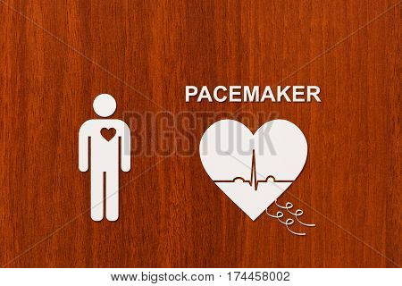 Man and heart shape with echocardiogram and PACEMAKER text. Medical cardiology concept
