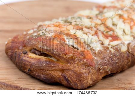 Pizza Sandwich On Wooden Board Over White
