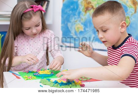cute children Playing with Color Play Dough