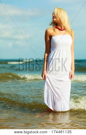 Young Woman Chilling Out On The Beach.