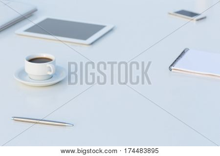 White working Place with Electronic Gadgets Paper Notepad Pen and Coffee in soft Tones with Copy Space