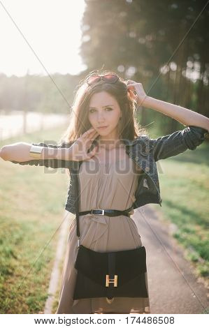 Summer Outdoor Porttrait Of Young Pretty Elegant Girl Posing Str