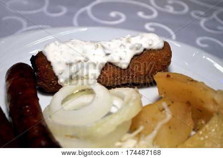Beautifully decorated with the white plate of homemade dishes. Kara