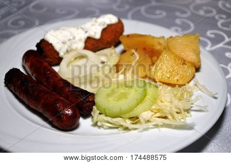 Beautifully decorated with the white plate of homemade dishes. Kara