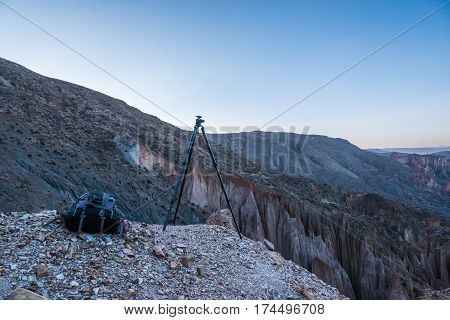 Tripod is ready to shoot photography. Mountains of Altiplano Bolivia South America.
