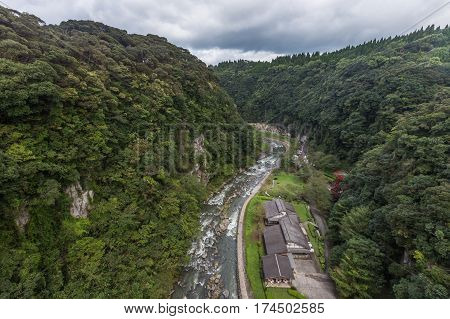 Green Valley And Japanese House In Kamikawa Otaki Waterfall Park, Kagoshima, Kyushu, Japan