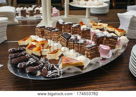 Delicious sweet buffet with cupcakes. Sweet holiday buffet with cupcakes and other desserts. Candy Bar.