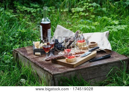 Sausage, Tomato, Bread And A Glasses Of Red Wine, Contryside.
