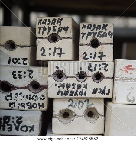 Saint-Petersburg Russia - February 21 2017: A small factory producing small batches pewter figurines. Shelves with forms for casting