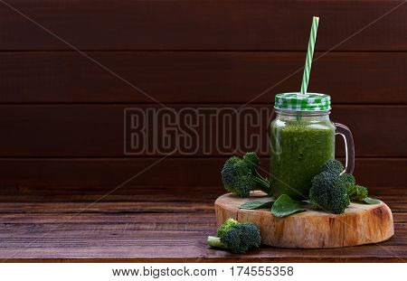 Green smoothie with broccoli, spinach and apple juice