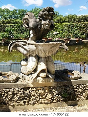 Triton Fountain , Boboli Gardens, Florence, Italy. Behind the Pitti Palace are the Boboli Gardens,