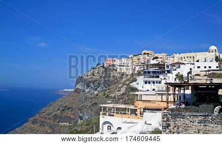 Thira, Greece - November 11, 2010: Houses in the town of Thira, the capital of the island of Santorini in Greece.