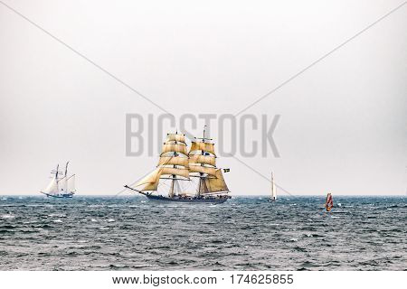 Sailing ship on the sea. Tall Ship.Yachting and Sailing travel. Cruises and holidays. Postcard and Book cover