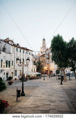 The narrow street of a small tourist town on the coast