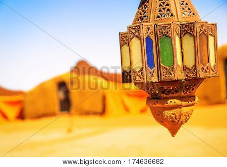 Coloreful Berber Lamp With Traditional Nomad Tents On Background