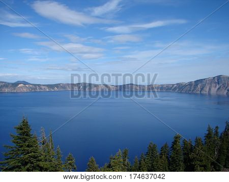 scenic blue crater lake and rim panorama in oregon