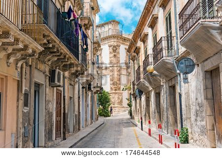 Small alley in the city of Scicli in Sicily, Italy
