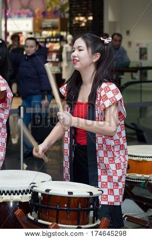 Moscow, Russia - March 5, 2017: Group Of Japanese Taiko Drummers Girls Perform In 