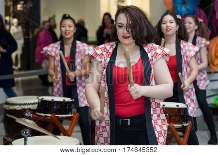Moscow, Russia - March 5, 2017: Group Of Japanese Taiko Drummers Girls Perform In 