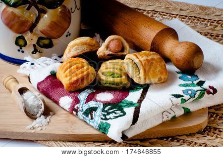 salty snacks displayed with a decorated jar and kitchen utensils