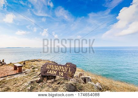 Beautiful seascape with rocks and meadow in cloudy blue sky at Khao Leam Ya National Park Rayong province Thailand