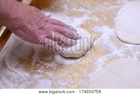 Preparing Dough For Pie On A Sofra