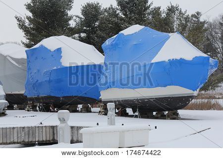 Shrink wrap on boats, on dry land during the winter season as protection against elements.