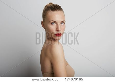 Portrait of beautiful young woman. over white background.