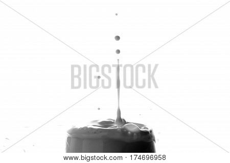 Milk in black and white/  Milk is a great source of calcium, which is essential for healthy bones