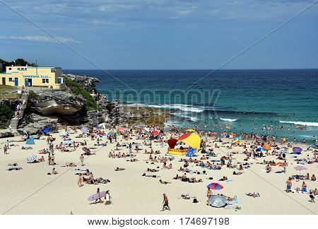 Sydney Australia - Feb 5 2017. People relaxing swimming and sun bathing on Tamarama beach.