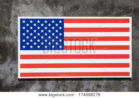 colorful U.S.A. flag sign decorate on concrete wall