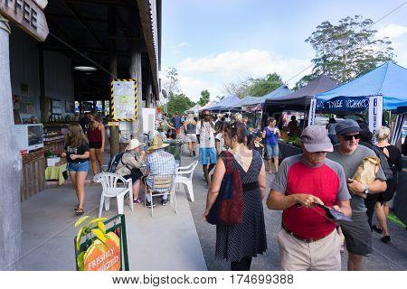 Kerikeri, New Zealand - February 11, 2017; Old Packhouse Market stalls and people wandering amongst vendors stalls and food sellers Kerikeri New Zealand.