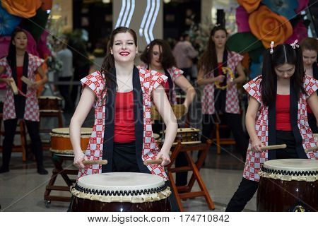 Moscow, Russia - March 5, 2017: Group Of Japanese Taiko Drummers Girls Perform In 