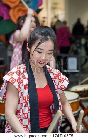 Moscow, Russia - March 5, 2017: Group Of Japanese Taiko Drummers Girls Perform In 