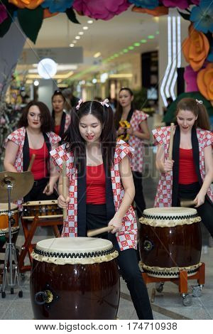 Moscow, Russia - March 5, 2017: Group Of Japanese Taiko Drummers Girls Perform In 