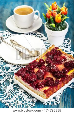 Tasty Curd tart with cherries. Studio Photo