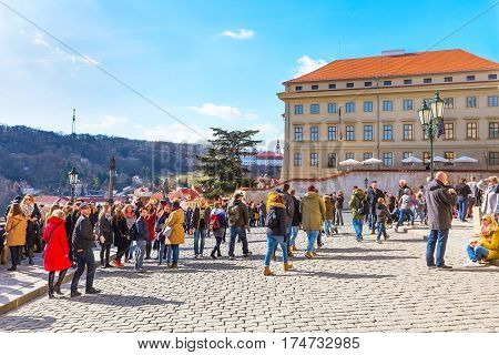 Prague, Czech Republic - February 25, 2017: People at panorama viewpoint at Prague castle, landmark of the city