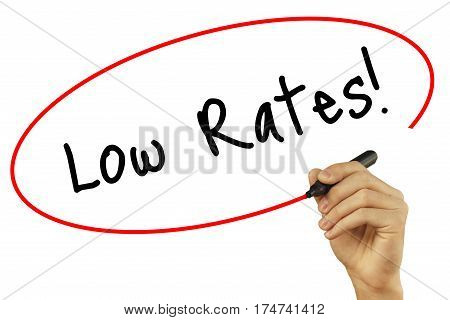 Man Hand Writing Low Rates! With Black Marker On Visual Screen. Isolated On White Background. Busine