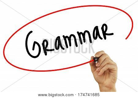 Man Hand Writing Grammar With Black Marker On Visual Screen. Isolated On Background. Business, Techn