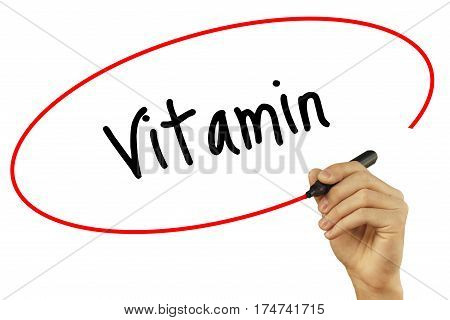 Man Hand Writing Vitamin With Black Marker On Visual Screen. Isolated On Background. Business, Techn